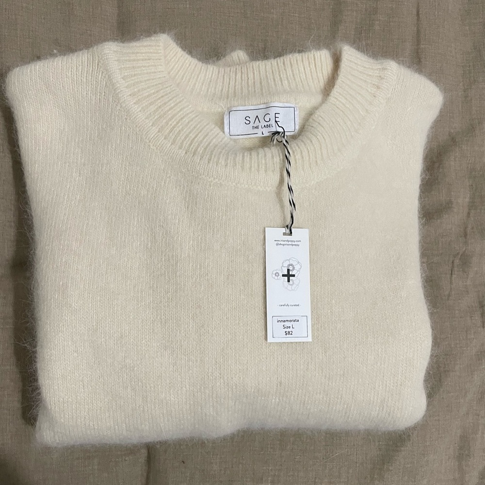 White furry sweater